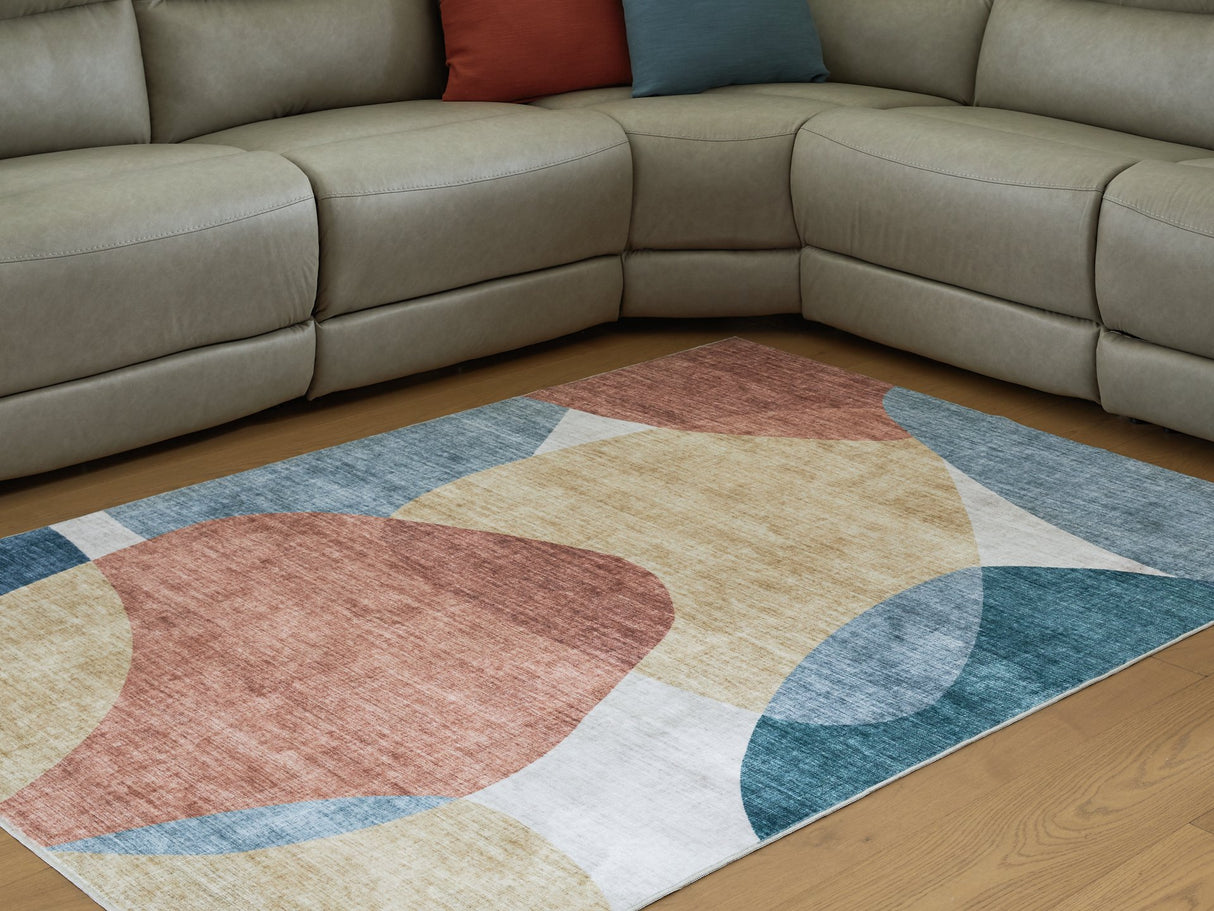 Chanleigh Washable 5' x 7' Area Rug - Furniture World