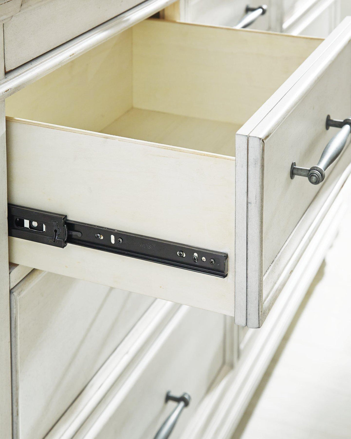 Kanwyn Dresser and Mirror - Furniture World
