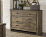 Trinell Bedroom Set - Furniture World