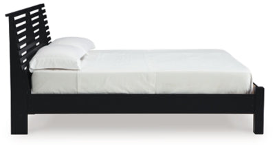 Danziar Queen Slat Bed - Furniture World
