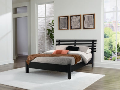 Danziar Queen Slat Bed - Furniture World