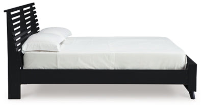 Danziar Queen Slat Bed - Furniture World
