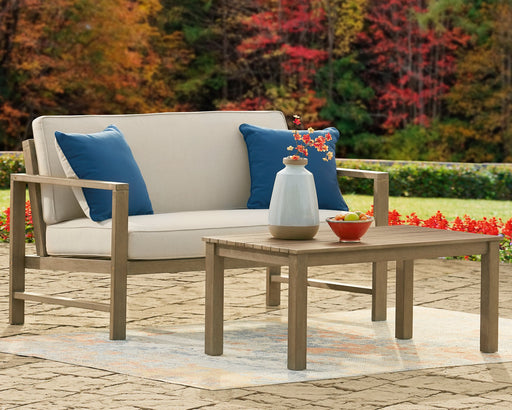 Fynnegan Outdoor Loveseat with Table (Set of 2) - Furniture World