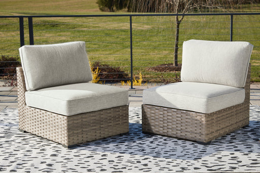 Calworth Outdoor Armless Chair with Cushion (Set of 2) - Furniture World