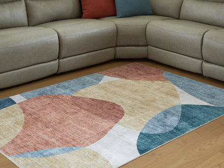 Chanleigh Washable 5' x 7' Area Rug - Furniture World