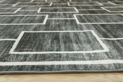 Elderland Washable 5' x 7' Area Rug - Furniture World