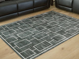 Elderland Washable 5' x 7' Area Rug - Furniture World