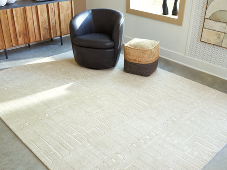 Wolbert 7'8" x 10' Area Rug - Furniture World