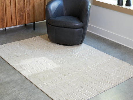 Wolbert 5' x 7' Area Rug - Furniture World